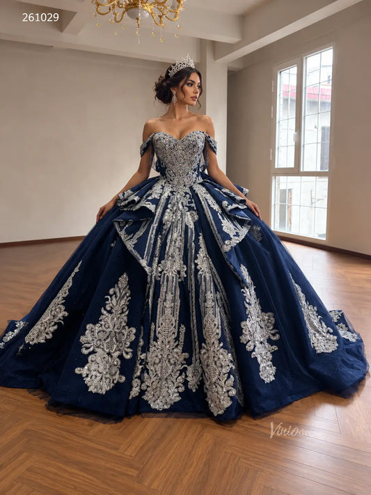 Navy blue ball gown with silver baroque embroidery, crystal-encrusted corset, off-the-shoulder straps, and cathedral train.