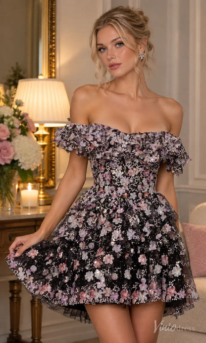 Black off-the-shoulder homecoming dress featuring 3D floral appliqués, shimmering sequins, a corset bodice, and tiered skirt.