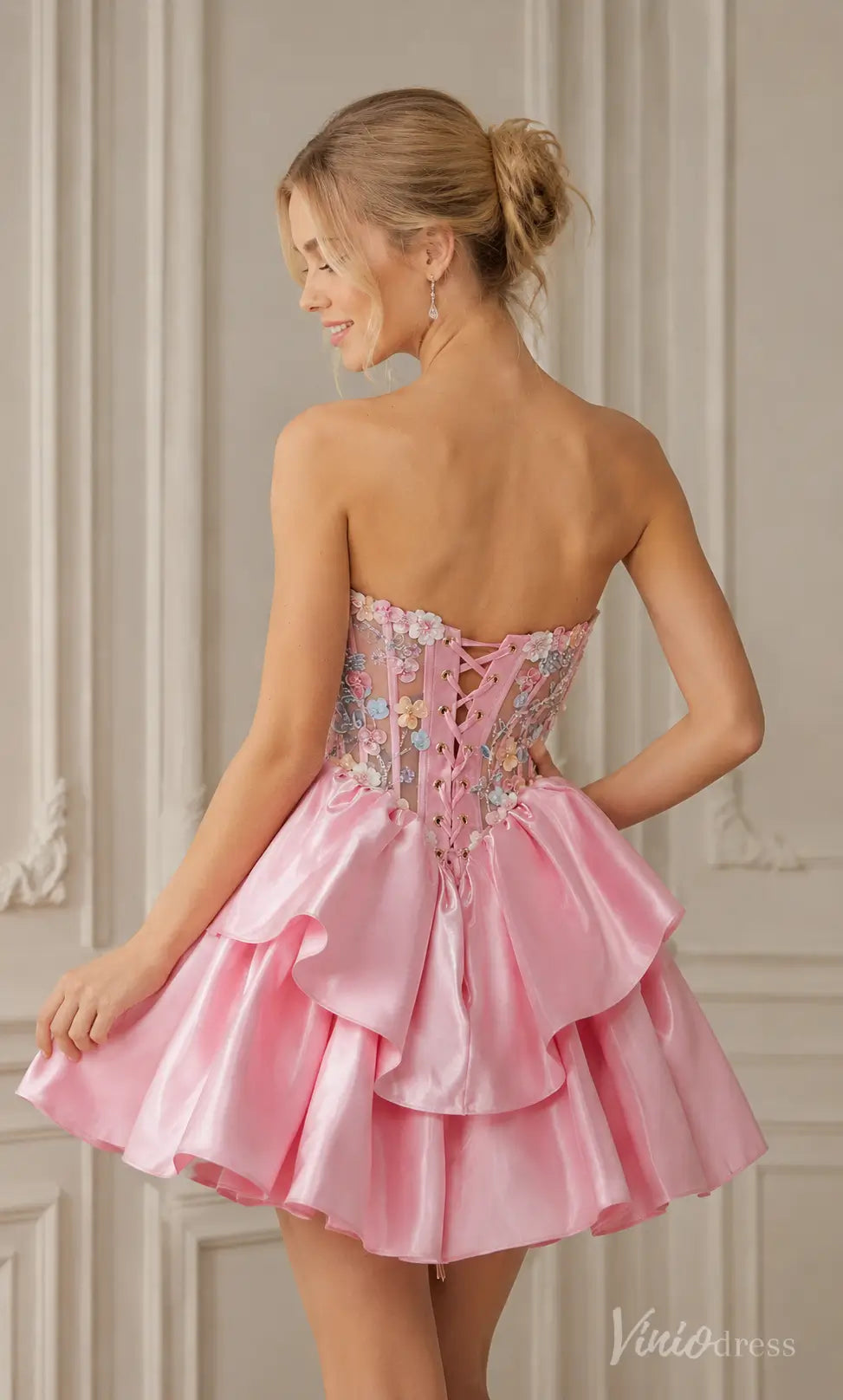 S26118 pink strapless mini dress with floral embroidered corset bodice and tiered satin skirt.