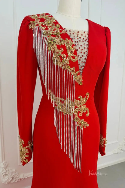 Red long sleeve evening dress with gold beaded lace and silver fringe detailing.