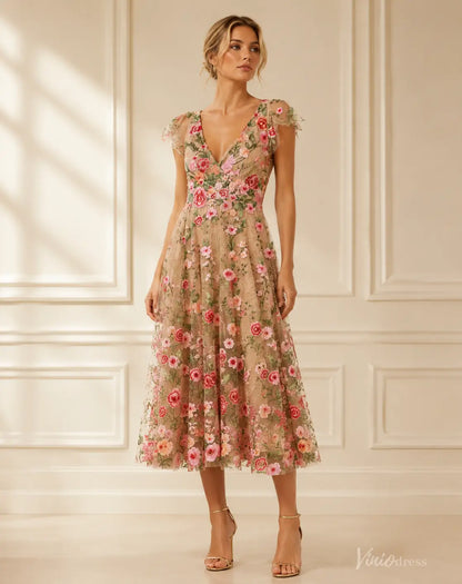 Midi length V-neck evening dress in nude mesh with vibrant pink and green floral embroidery and delicate cap sleeves.
