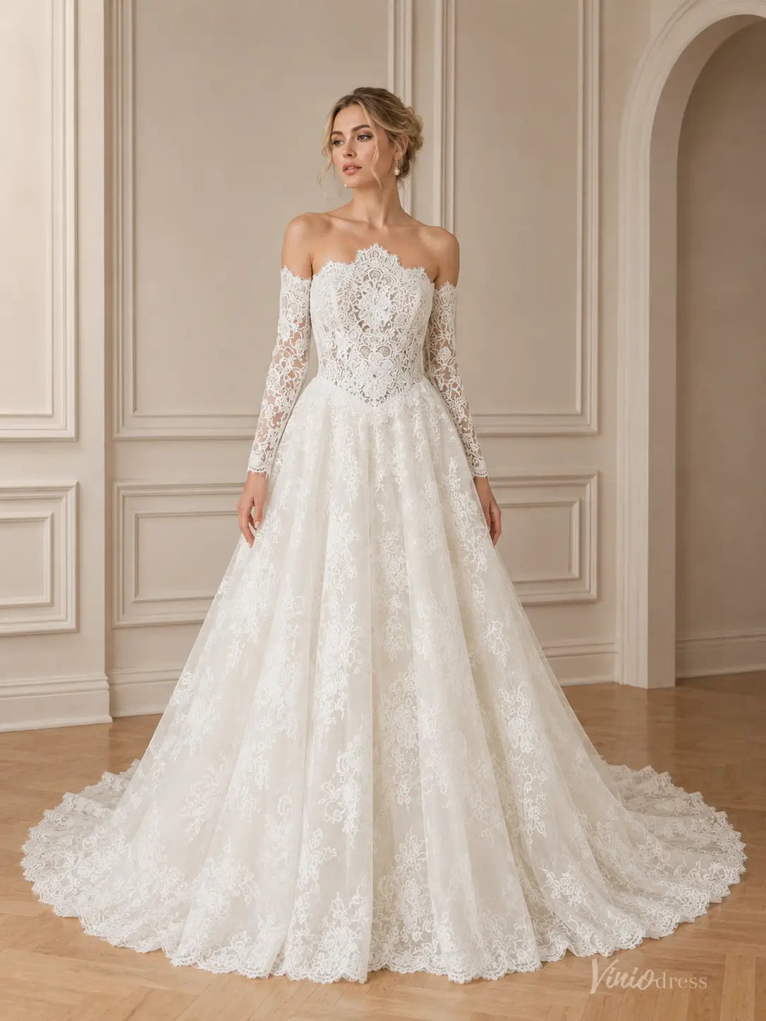 Off-the-shoulder white lace wedding dress with long sleeves and a full A-line skirt featuring intricate floral embroidery.