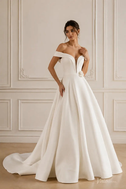 Ivory satin A-line wedding dress with off-shoulder sleeves, plunging V-neckline, and 3D floral waist detail.