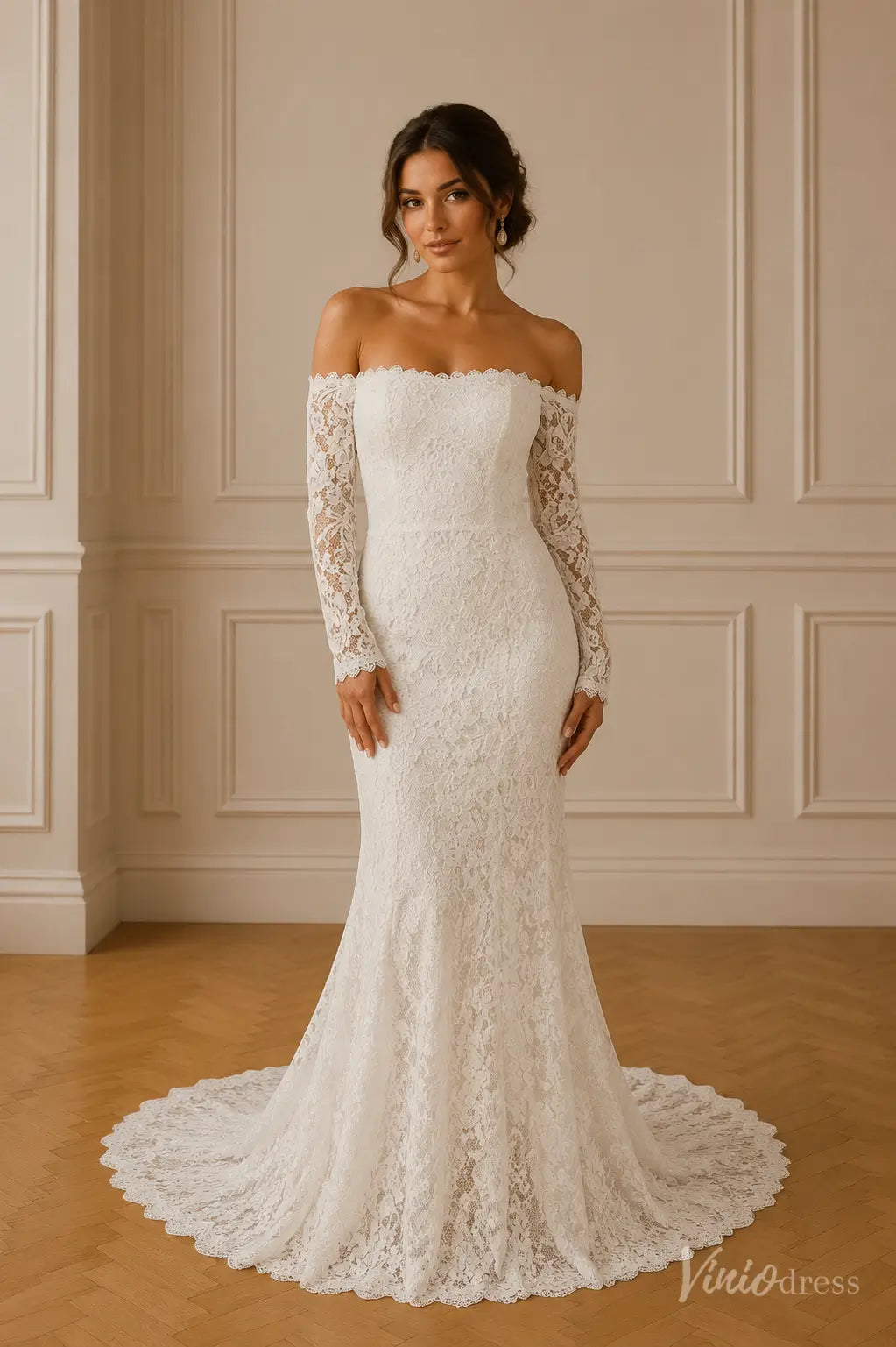Off-the-shoulder white lace mermaid wedding dress with long sheer sleeves and a scalloped train.