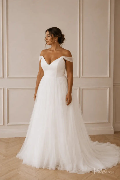 White off-the-shoulder A-line wedding dress with a V-neckline, satin bodice, and a flowing tulle skirt with a train.