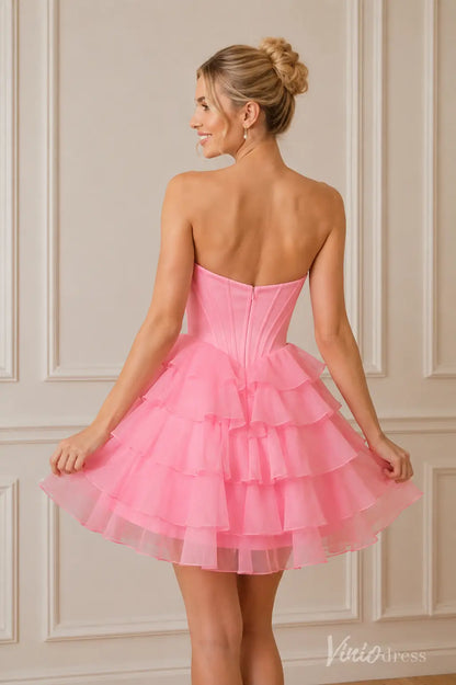 Pink strapless corset dress with a tiered ruffle tulle skirt, style S26126.