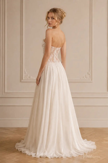 Strapless ivory beach wedding dress with a sheer lace corset bodice and a flowing A-line chiffon skirt.