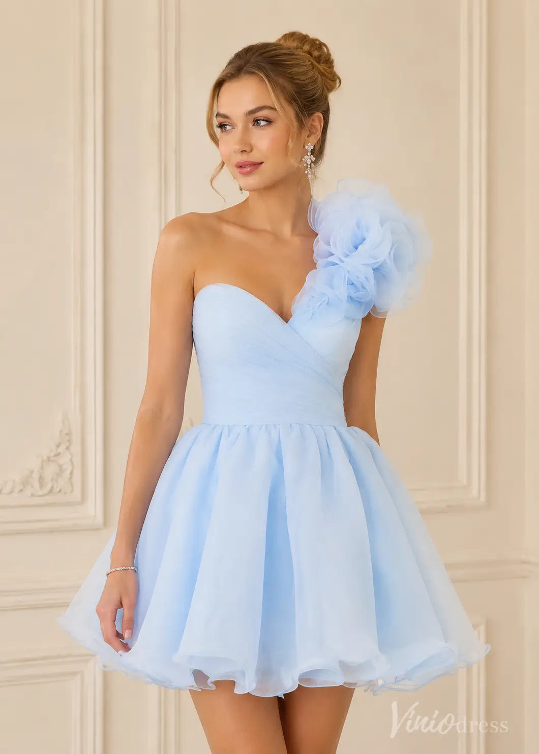 Light blue organza S26098 mini dress with one-shoulder floral appliqué and sweetheart neckline.