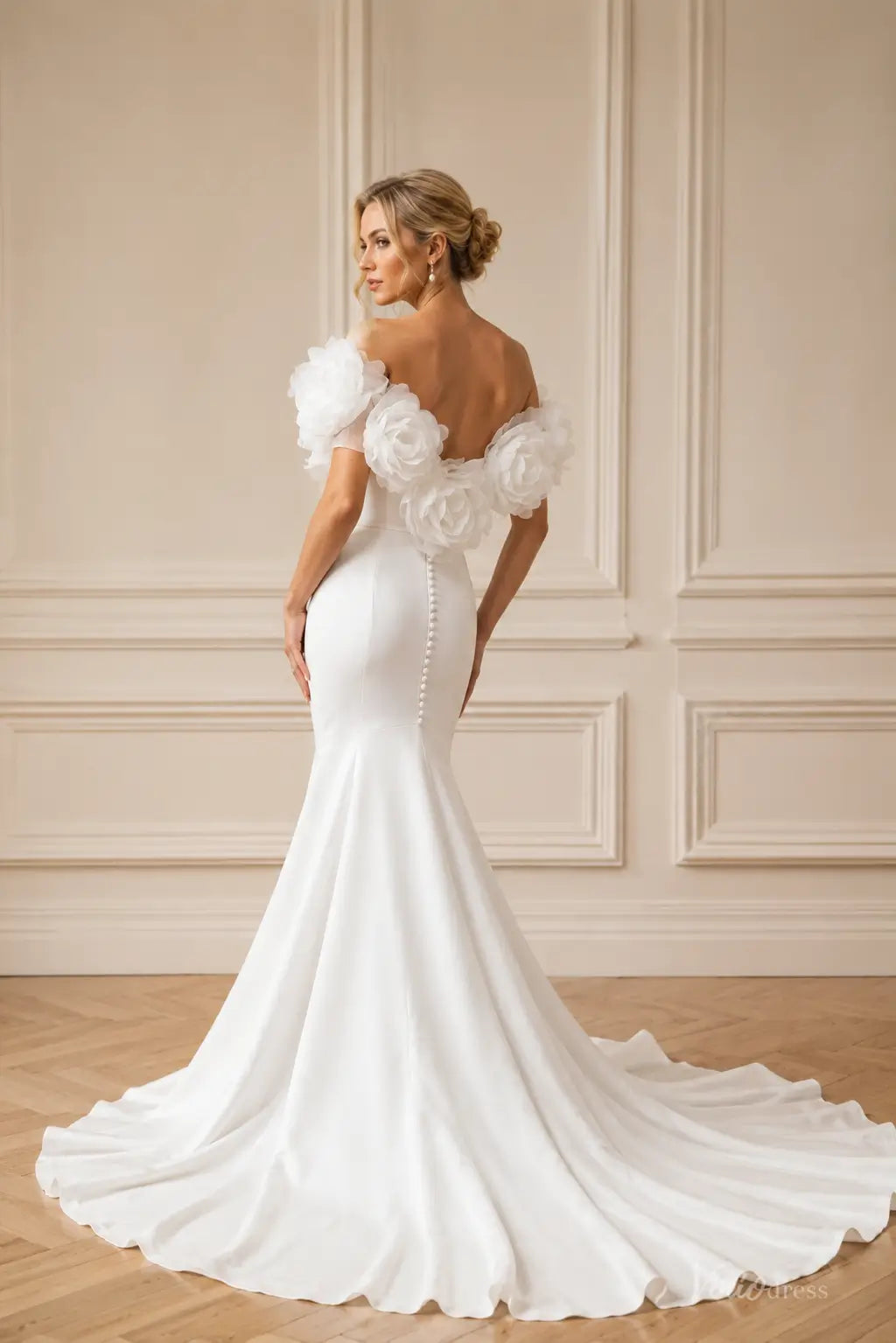 Ivory crepe mermaid wedding dress with off-shoulder 3D floral neckline, low back, and button-down chapel train.
