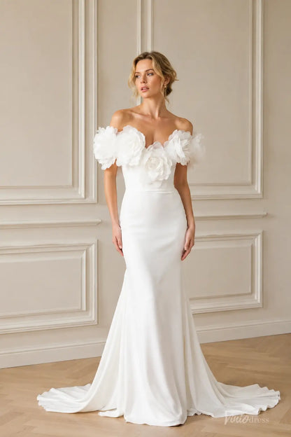 Ivory crepe mermaid wedding dress with an off-shoulder sweetheart neckline and oversized 3D floral accents.