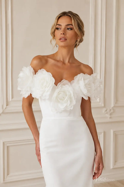 Ivory crepe mermaid wedding dress with an off-shoulder sweetheart neckline and oversized 3D floral accents.