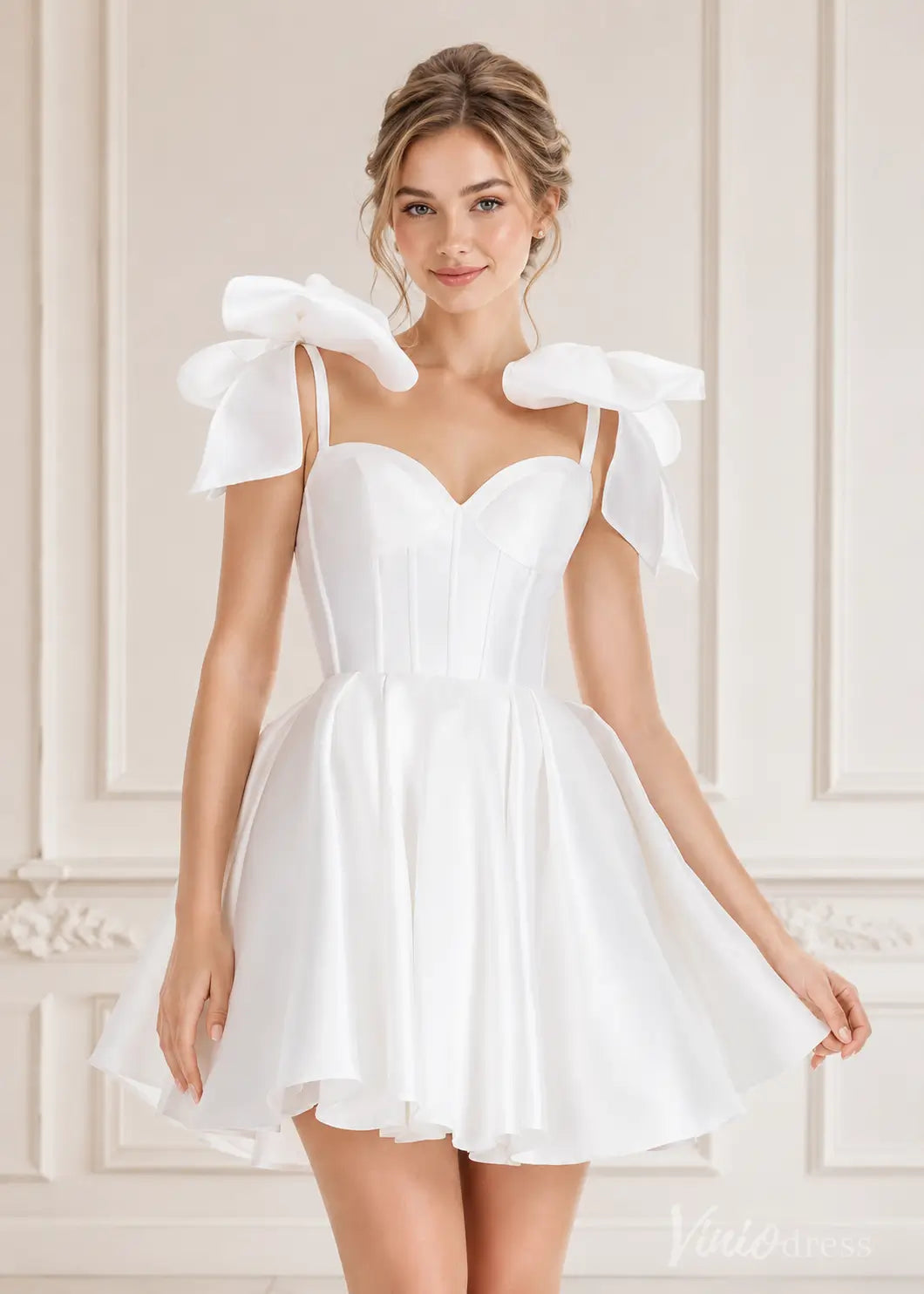 White satin mini dress S26095 with sweetheart neckline, corset bodice, and large shoulder bows.
