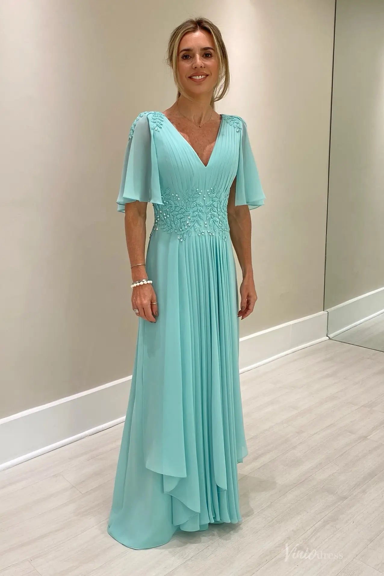 turquoise evening dress with sleeves Arabic Luxury Dubai Cape SS085 sheer sleeves embellished with delicate sequin patterns Blushouse - turquoise-gown