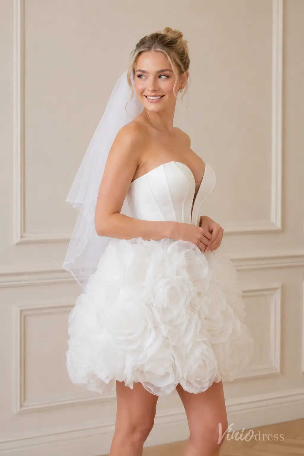 Strapless white mini wedding dress S26130 with a corset bodice and ruffled rosette skirt.