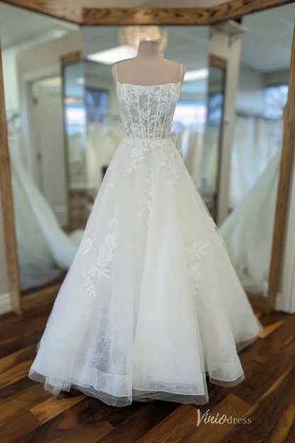 Elegant Ivory Floral Lace A-Line Wedding Dress with Sheer Corset Bodice, Spaghetti Straps & Chapel Train – LA157