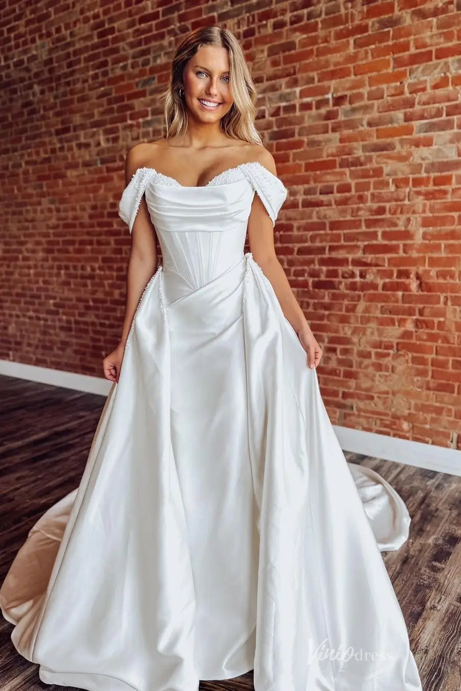 Elegant Off-the-Shoulder Satin Wedding Dress with Pearl Beaded Neckline, Corset Bodice & Removable Overskirt Chapel Train – MS152