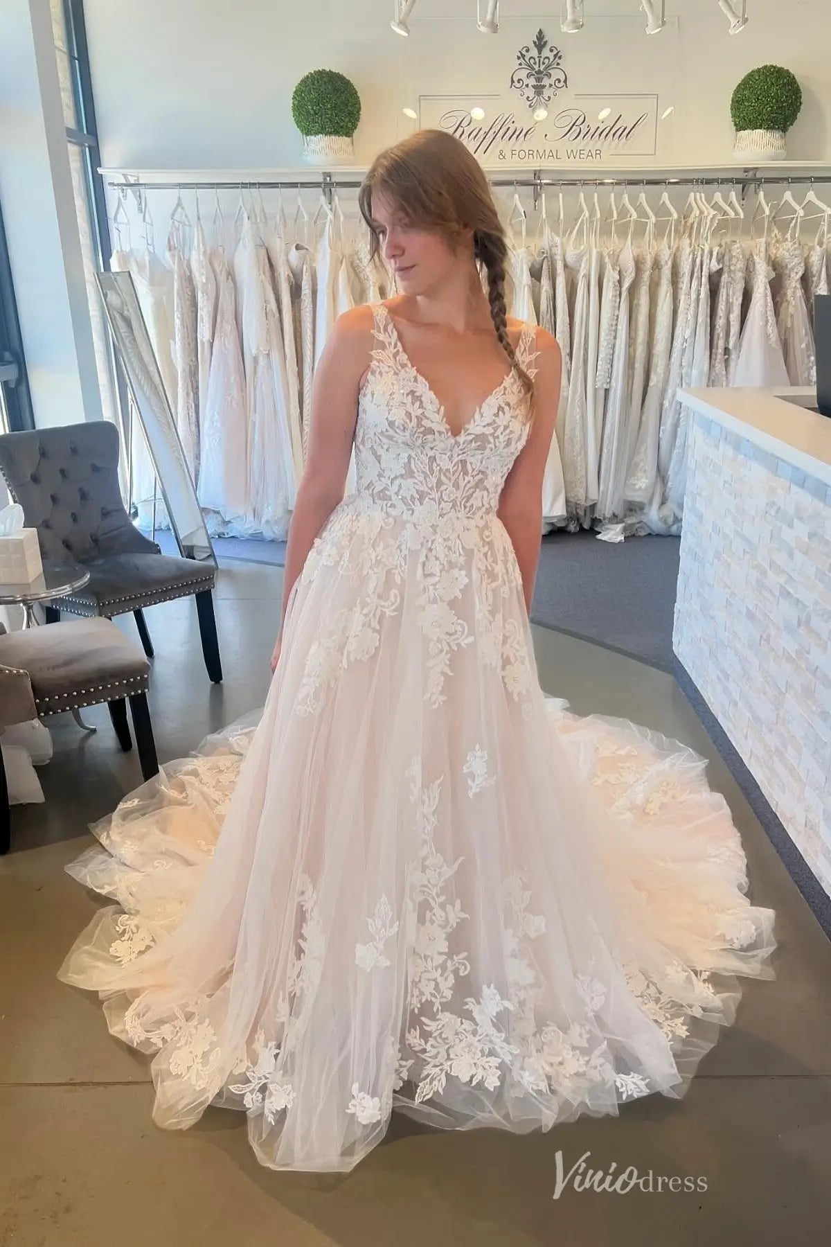 Ethereal Blush Lace Appliqué A-Line Wedding Dress with V-Neck Bodice, Illusion Details & Chapel Train – LA150