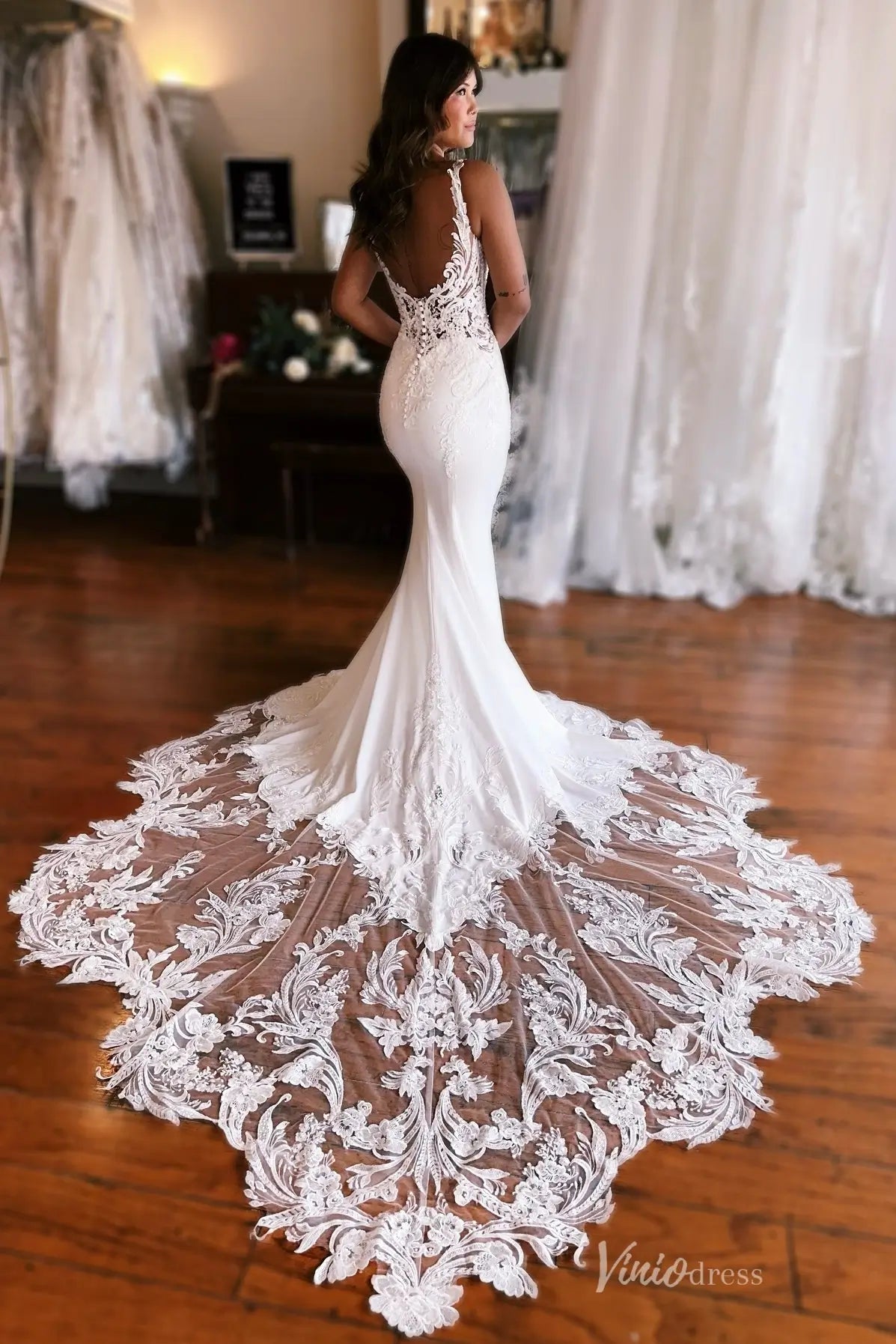 Graceful Lace Fit-and-Flare Wedding Dress with Illusion Back & Cathedral Train – SL001