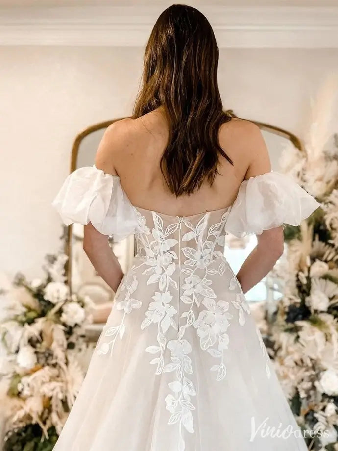 Ivory Floral Appliqu A-Line Wedding Dress with Strapless Sheer Corset, Puff Sleeves & Cathedral Train LA134 Viniodress Ivory Floral Appliqu A-Line Wedding Dress with Strapless Sheer Corset, Puff Sleeves & Cathedral Train LA134 Viniodress