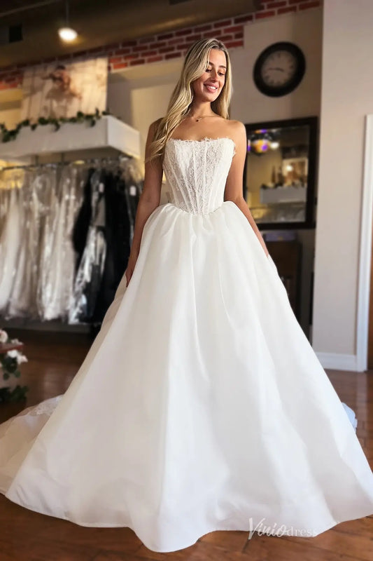 Ivory Strapless Ball Gown Wedding Dress with Lace Corset Bodice, Oversized Bow Back & Chapel Lace Train – LC107